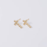 Coastal Grit Dainty Cross Earrings