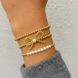 Gold Bead Bow Bracelet with Pearl
