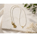 White Bead Gold Cross Necklace